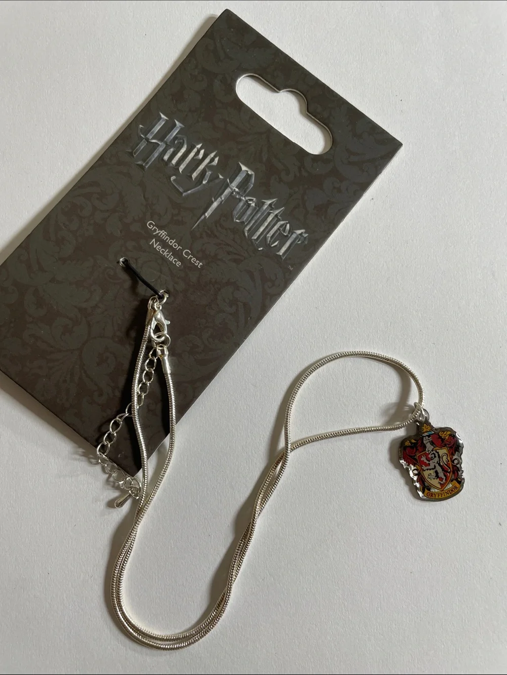 Harry Potter Kids Gryffindor Crest Necklace — Silver with Red Accent 8+